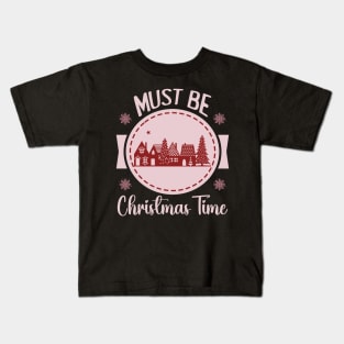 Must be Christmas TIme [bright pink text] Kids T-Shirt